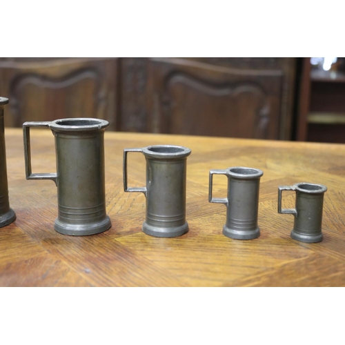 1148 - Good heavy set of seven antique French pewter graduating measures, largest 1 litre, approx 19cm H x ... 
