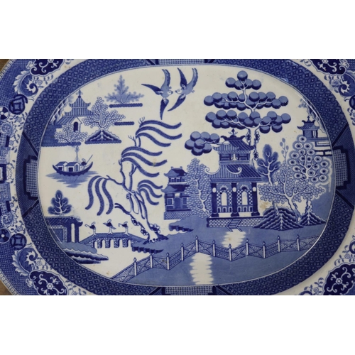 1030 - Large antique English blue & white deep dish meat platter, willow pattern, approx 52.5cm L x 44cm W