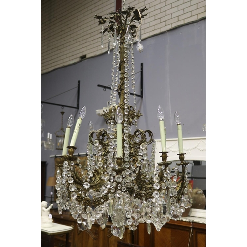 1143 - Impressive large eight light bronze chandelier, scrolling bronze leaf arms, with applied cast bronze... 