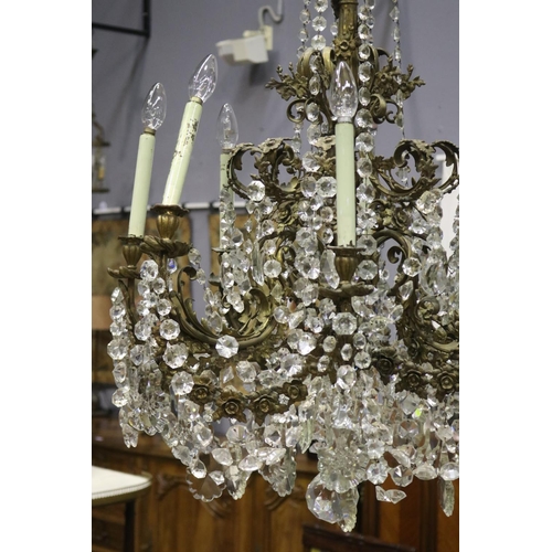 1143 - Impressive large eight light bronze chandelier, scrolling bronze leaf arms, with applied cast bronze... 