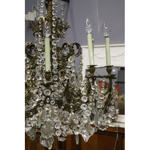 1143 - Impressive large eight light bronze chandelier, scrolling bronze leaf arms, with applied cast bronze... 