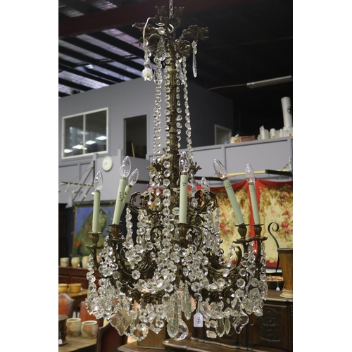 1143 - Impressive large eight light bronze chandelier, scrolling bronze leaf arms, with applied cast bronze... 