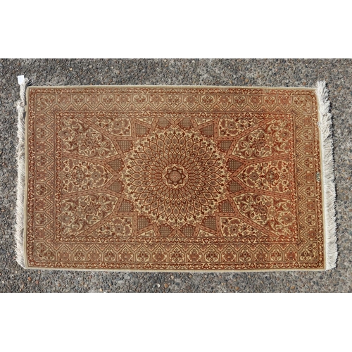 164 - Persian silk rug of brown tones, approx 123cm x 77cm