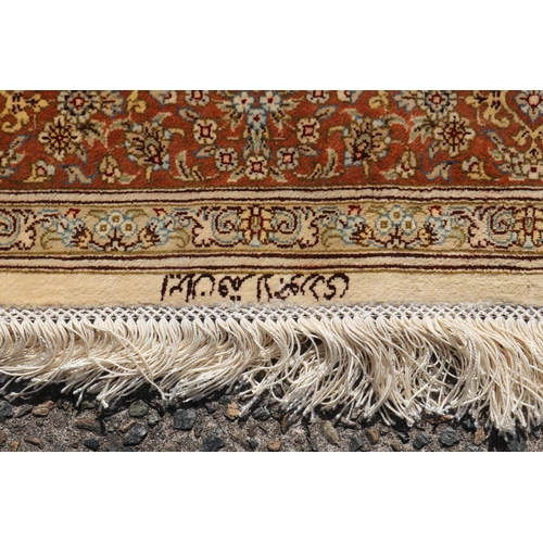 187 - Silk Qum carpet with central medallion on ivory field, inscribed to one end, approx 147cm x 99cm