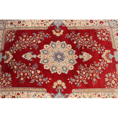 232 - Persian silk carpet with a lobed medallion on claret field with Shah Abbas flowers, approx 238cm x 1... 