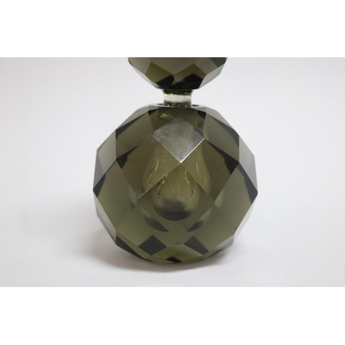 27 - Faceted circular smokey glass scent bottle, approx 13cm H
