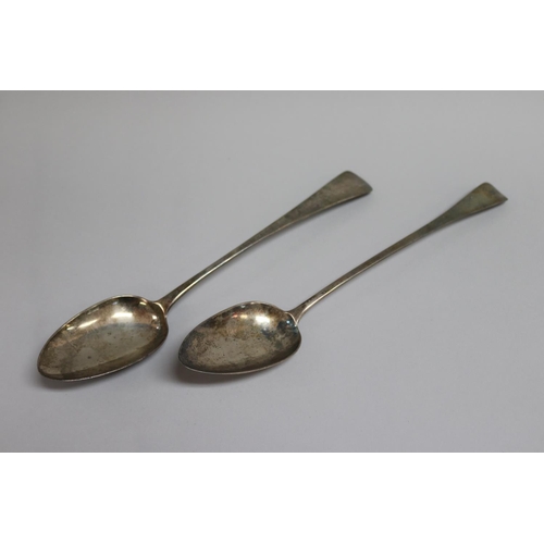 33 - Two antique George III similar Old English pattern sterling silver basting spoons, London 1808-9 and... 