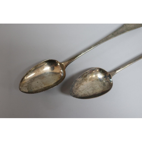 33 - Two antique George III similar Old English pattern sterling silver basting spoons, London 1808-9 and... 
