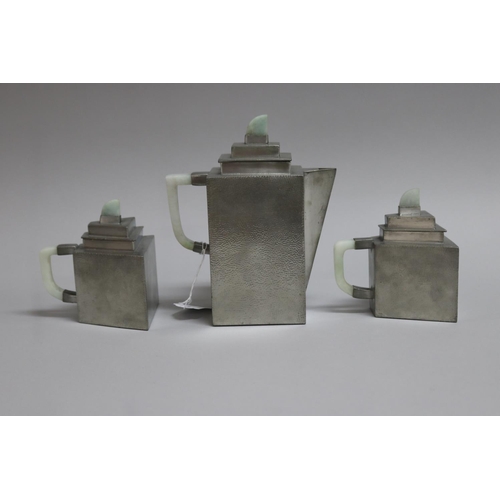 41 - Chinese three piece Art Deco hammered pewter and hard stone handle coffee service, approx 18cm H and... 