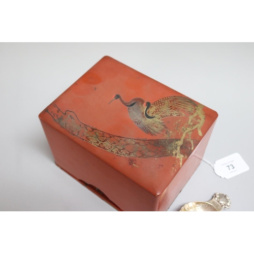 73 - Japanese red lacquer tea caddy with silver caddy spoon, approx 10cm H x 11.5cm W x 15cm D