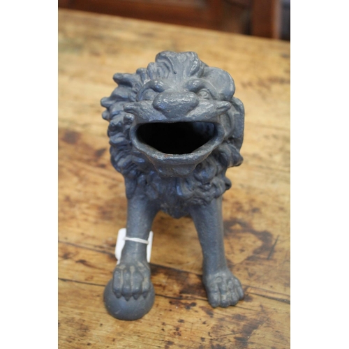 1046 - Antique French cast iron seated lion fountain spout, approx 17cm H x 11cm W X 18cm D