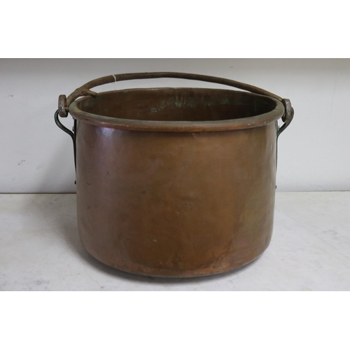 1055 - Large antique French copper and wrought iron swing handled pot, approx 24cm H x 23.5cm Dia (excludin... 