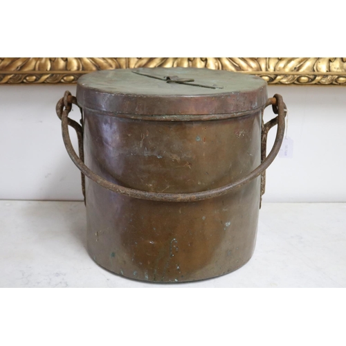 1056 - Large French copper and wrought iron swing handled lidded pot, approx 34cm H x 5cm Dia (excluding ha... 