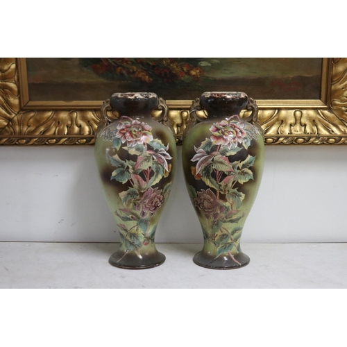 236 - Pair of Japanese twin handled vases decorated with roses, one with chip to rim, each approx 46cm H (... 