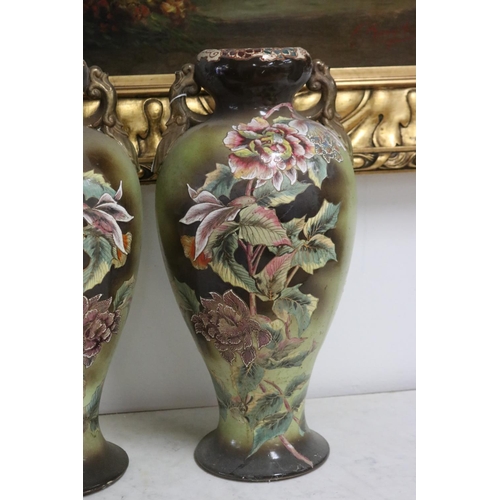 236 - Pair of Japanese twin handled vases decorated with roses, one with chip to rim, each approx 46cm H (... 