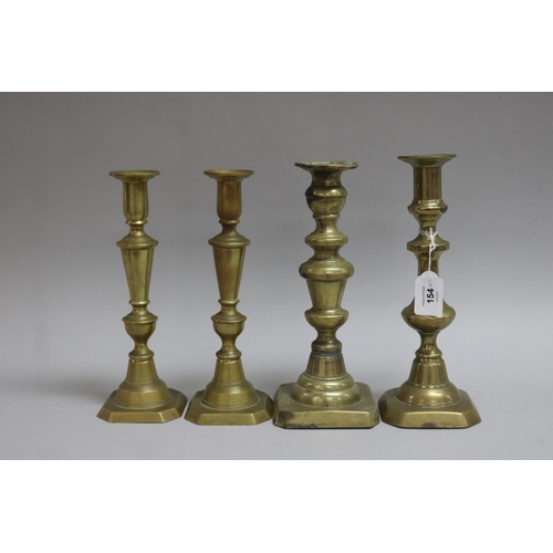 154 - Pair of brass candlesticks and two other similiar brass candlesticks (4)