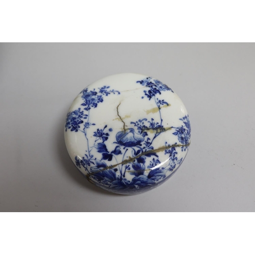 168 - Japanese porcelain covered jar decorated in blue and white birds and peonies (AF) on stand, total ap... 