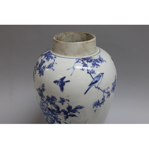 168 - Japanese porcelain covered jar decorated in blue and white birds and peonies (AF) on stand, total ap... 