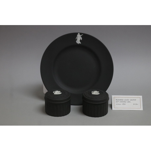 89 - Wedgwood black basalt plate and a pair of small circular lidded trinket boxes, approx 20cm Dia and s... 