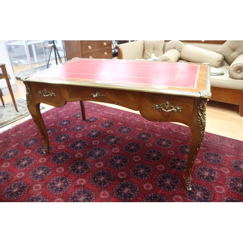 171 - French Louis XV style bureau plat, with tooled red leather writing surface, brass banded edge, and c... 