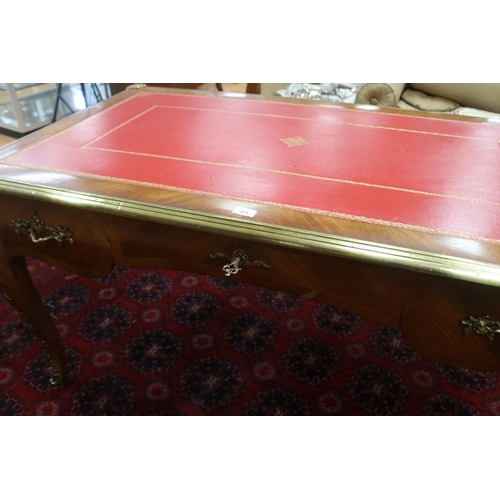 171 - French Louis XV style bureau plat, with tooled red leather writing surface, brass banded edge, and c... 