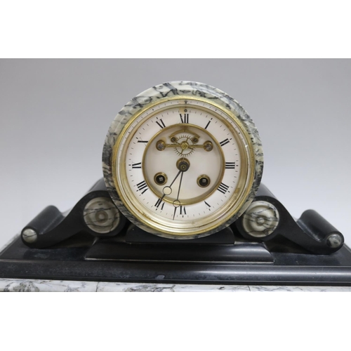 220 - Victorian slate and grey marble cased mantle clock with visible escapement, has key and pendulum (in... 