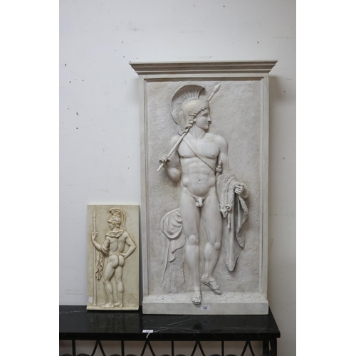 229 - Composition plaque of a nude gladiator by Brian Burrows and a smaller resin plaque example, approx 1... 