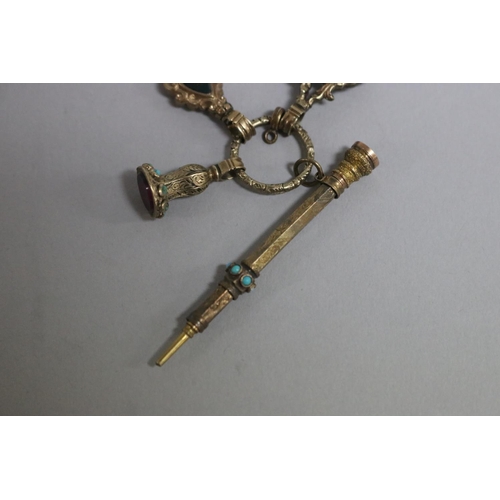 248 - Antique Victorian  miniature rolled gold and gilt chatelaine to include in retractable pencil, clock... 