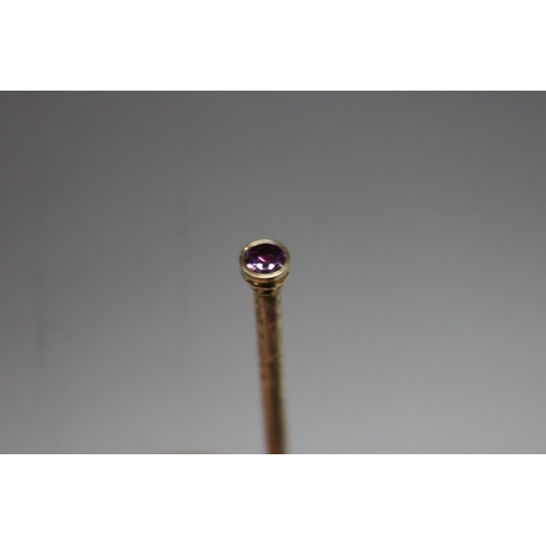 250 - Gold large retractable pencil with amethyst seal, approx 6 grams