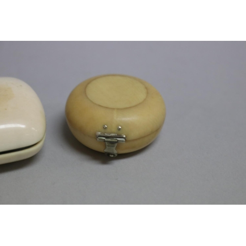 258 - Antique ivory coin purse, a small circular ivory box and silver and ivory pill box, approx 8cm W and... 