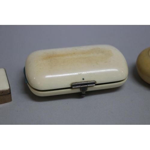 258 - Antique ivory coin purse, a small circular ivory box and silver and ivory pill box, approx 8cm W and... 