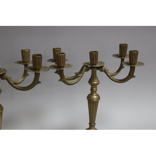 1029 - Pair of French brass four stick candelabra, approx 30cm H x 26cm L x 13.5cm W (2)