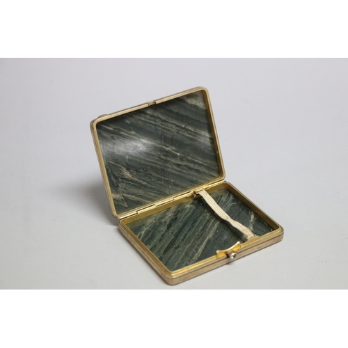 256 - Russian silver gilt nephrite cigarette box with cabochon aquamarine, approx 1.5cm H x 9cm W x 7cm D