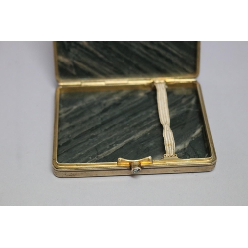 256 - Russian silver gilt nephrite cigarette box with cabochon aquamarine, approx 1.5cm H x 9cm W x 7cm D