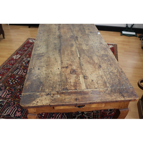 1028 - Antique French Louis XV style rustic fruitwood dining table, the cleated plank top above a slide and... 