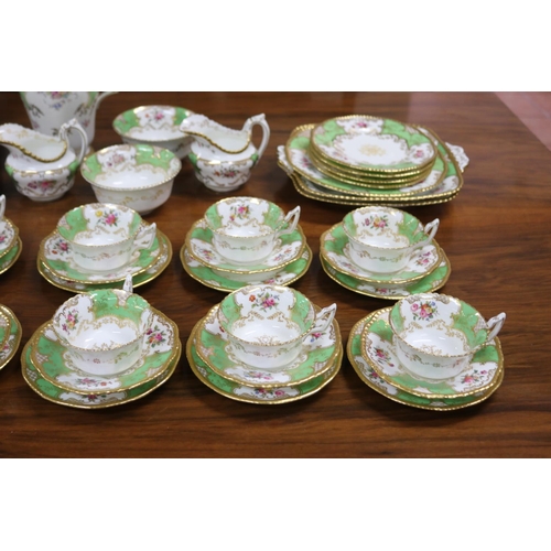 234 - Coalport afternoon coffee service decorated in apple green and gold with flower sprays comprising cu... 