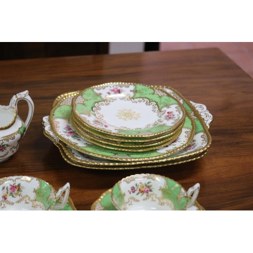 234 - Coalport afternoon coffee service decorated in apple green and gold with flower sprays comprising cu... 