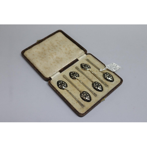 298 - Set of six hallmarked gilt sterling silver and black and white enamelled cased teaspoons, Birmingham... 
