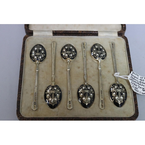 298 - Set of six hallmarked gilt sterling silver and black and white enamelled cased teaspoons, Birmingham... 