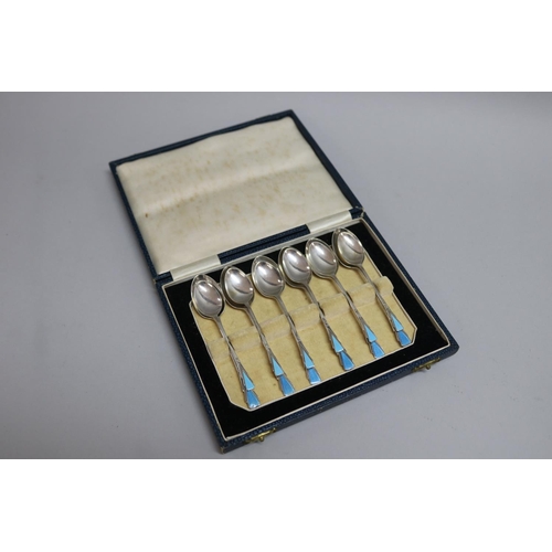 299 - Hallmarked sterling silver set of six coffee spoons and a set of six teaspoons, both sets enamelled,... 