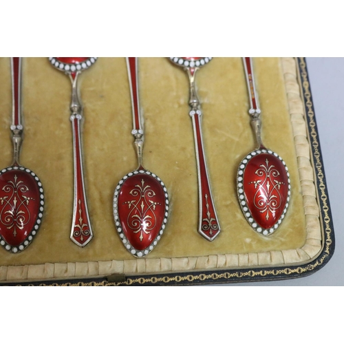 300 - Set of six antique gilt silver and red and white enamelled teaspoons, Birmingham 1896-97, with some ... 