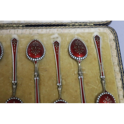 300 - Set of six antique gilt silver and red and white enamelled teaspoons, Birmingham 1896-97, with some ... 
