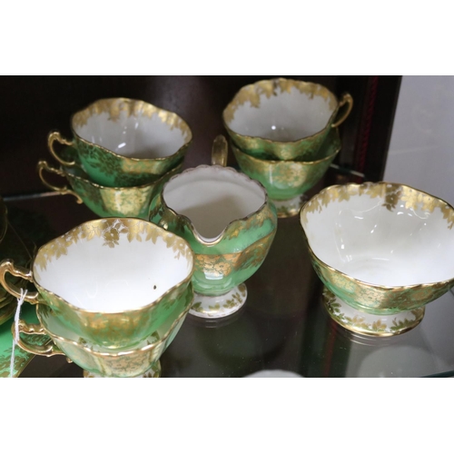 315 - Hammersley Longton Co, Art Deco part tea set decorated in green & gilt, comprising of six cups & fiv... 