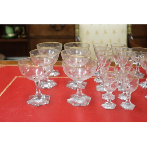 191 - Part suite of antique French gilt highlighted star pattern glassware