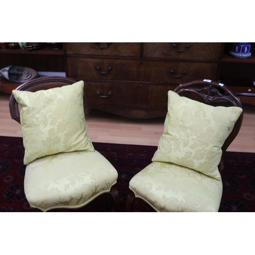 222 - Two similar Victorian walnut balloon back chairs in yellow damask upholstery (2)