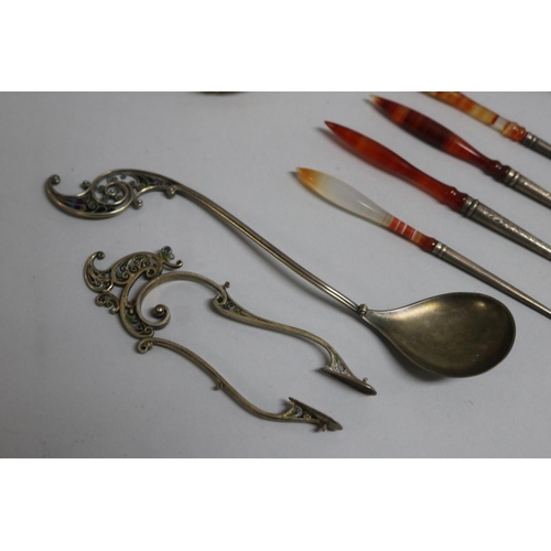 267 - Four silver pickle forks with agate handles with agate handles with an agate handle pen with seal, a... 