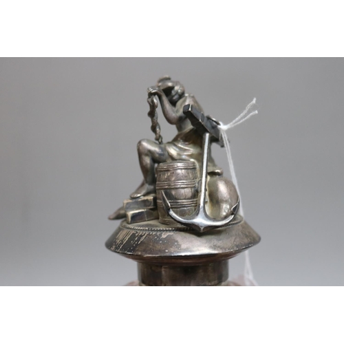 291 - Continental silver circular ink stand surmounted by a figure of Mercury, seated on a bale inscribed ... 