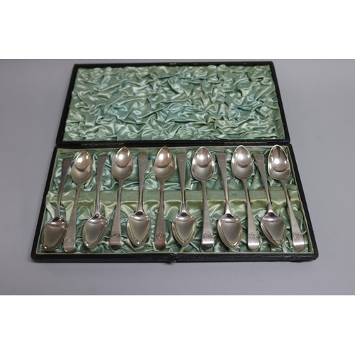 293 - Cased set of twelve Old English pattern hallmarked sterling silver teaspoons, engraved with monogram... 