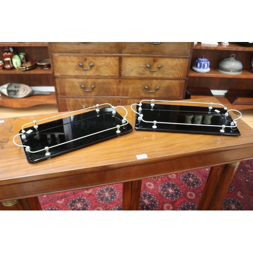 319 - Near pair of chrome & glass drinks trays, approx 45.5cm x 22.5cm & 44cm x 23cm (2)