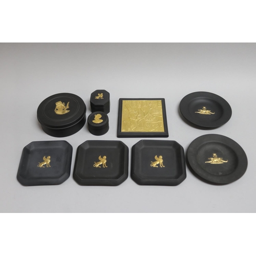 100 - Group of nine Wedgwood “Egyptian Collection” black and gilt basalt, including circular boxes, dishes... 